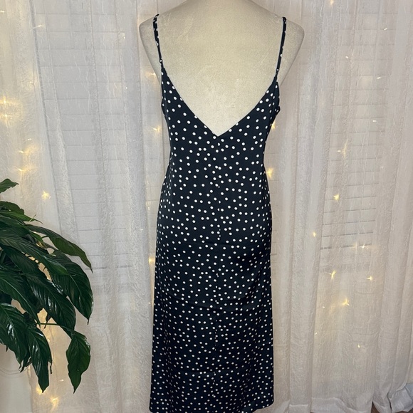 Elegant Black and White Polka Dot Midi Dress - Picture 6 of 9